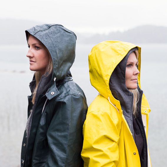 Two ladies standing in the rain